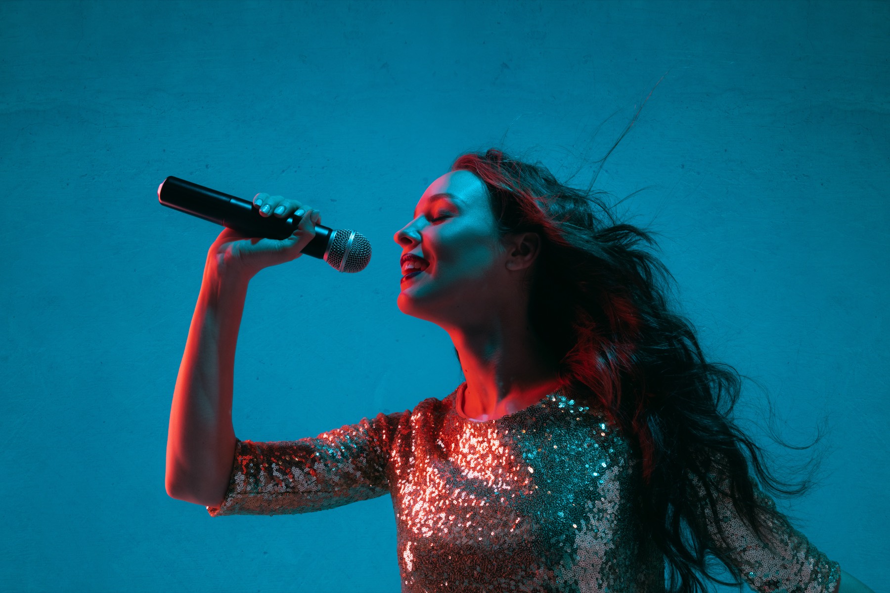 A vocalist mid-performance